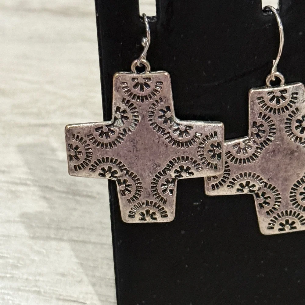 Vintage cross earrings Navajo ,pressed design w/a crystal on back of 1 earring